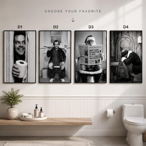 May include: Four black and white wall art prints labelled D1 through D4. D1 shows a man holding a toilet paper roll. D2 shows a man sitting on a toilet holding an axe. D3 shows Santa Claus reading a newspaper. D4 shows a person sitting on a toilet.
