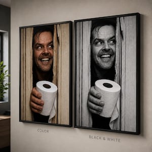 May include: Two framed wall art prints featuring a man peering through a broken wooden door while holding a roll of toilet paper. One print is in sepia tones labelled COLOR, and the other is in monochrome labelled BLACK & WHITE, both in black frames.