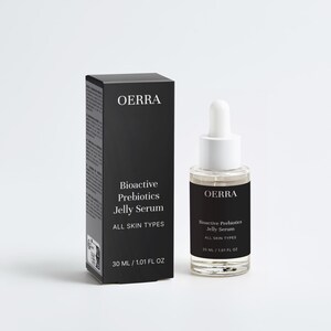 May include: A black box and a clear glass bottle of OERRA Bioactive Prebiotics Jelly Serum. The box and bottle have white text that reads "Bioactive Prebiotics Jelly Serum ALL SKIN TYPES 30 ml / 1.01 fl oz". The bottle has a white dropper.