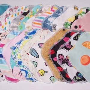 Set of  6/7/12  Flannel  light thin panty liners with wings 8 inches in assorted prints with option for extra snap