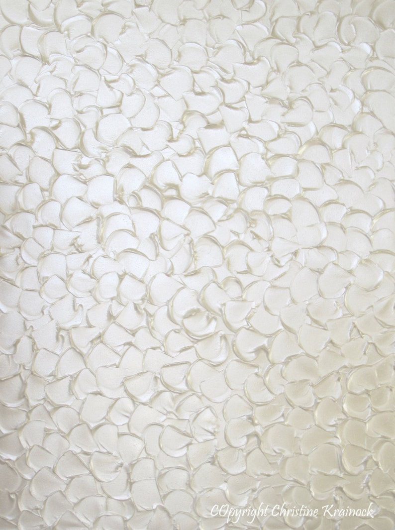 May include: White abstract painting with a textured, raised surface. The paint is applied in a swirling, circular pattern, creating a sense of movement and depth.