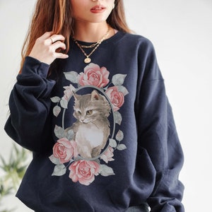Cat in sweatshirt store