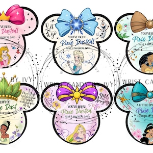 May include: Six whimsical Disney-themed gift tags in the shape of Mickey Mouse ears. Each tag features a different princess, a bow, and the phrase "You've Been Pixie Dusted!" with a space to write "From".
