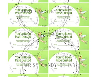 May include: A sheet of ten rectangular gift tags with a light green background. Each tag features a white circle containing a cartoon fairy, the text "You've Been Pixie Dusted", "Spreading a little magic to brighten your day!!", and a line for "From".