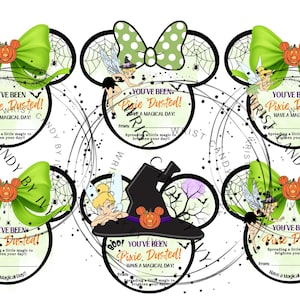 May include: Six circular gift tags featuring mouse-ear silhouettes with green bows, spiderwebs, and Tinker Bell illustrations. The text reads: You've been Pixie Dusted! Have a magical day! Spreading a little magic to brighten your day! From: blank line.