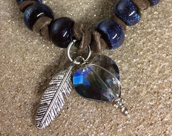 Pottery beads, leather, crystal and silver bracelet