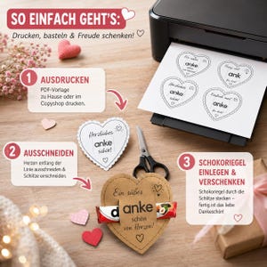 May include: A DIY craft project showing a printer with a sheet of paper featuring four heart-shaped templates with the text 'anke'. A pair of scissors, a cut-out heart, and a brown paper heart holding a chocolate bar with the text 'anke' are shown.