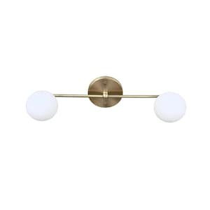 May include: A modern, two-light vanity fixture with a brass finish. The fixture features a circular wall mount, a horizontal bar, and two spherical, frosted glass shades. The design is minimalist and suitable for bathrooms or hallways.