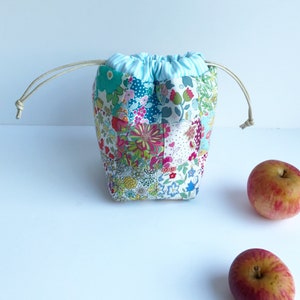 Drawstring Patchwork Bag Pattern, easy sewing tutorial for small modern pouch design, beginner friendly PDF instructions download by Tikki