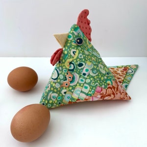 Chicken Patchwork Sewing Pattern is a tutorial to make 3D fabric birds from Log Cabin quilt blocks, PDF Easter crafts by Tikki London, there's an opening in the back seam to allow for small Easter eggs to be hidden inside.