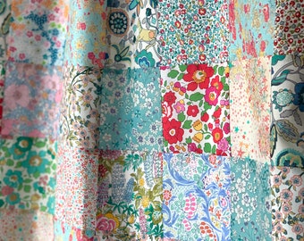 Baby Cot Quilt Sewing Pattern PDF, easy patchwork blanket project for beginners, sample made in ditsy floral Liberty fabrics.