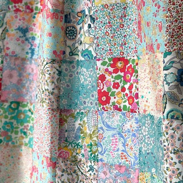 Baby Cot Quilt Sewing Pattern PDF, easy patchwork blanket project for beginners, sample made in ditsy floral Liberty fabrics.