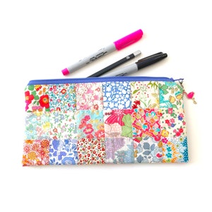 Easy Patchwork Pencil Case PDF Sewing Pattern, sample pouch made in pretty Liberty London ditsy floral fabrics, quilted zip bag tutorial.