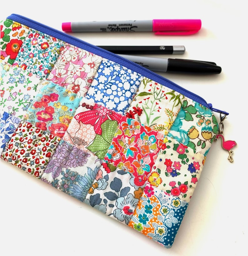 Easy Patchwork Pencil Case PDF Sewing Pattern, sample pouch made in pretty Liberty London ditsy floral fabrics, quilted zip bag tutorial.