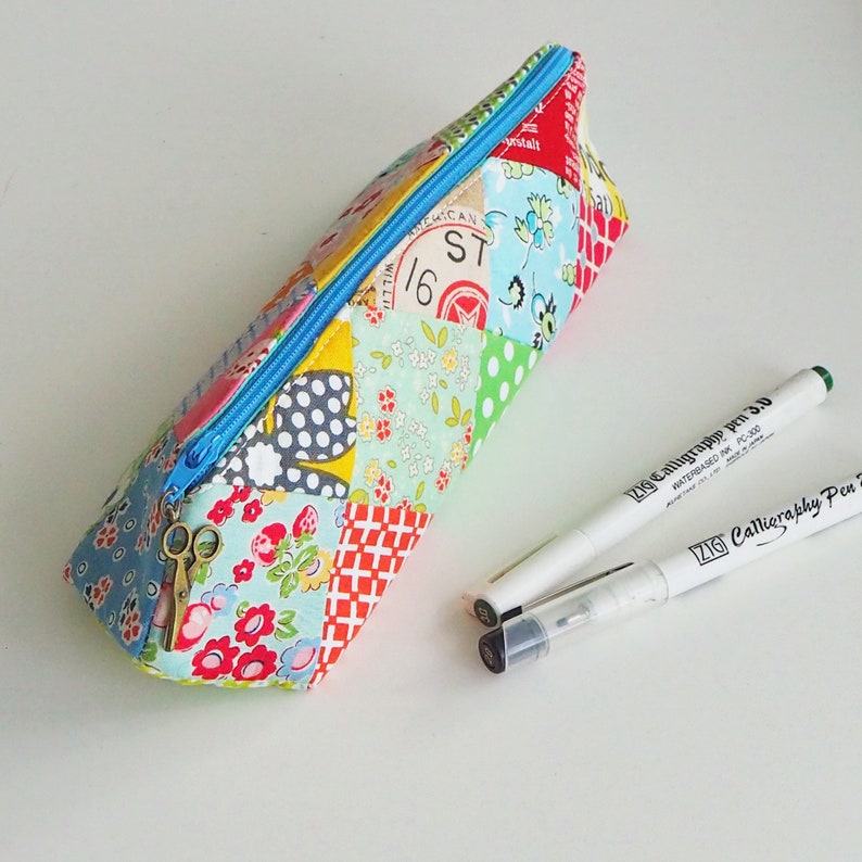 Pencil case pouch PDF sewing pattern, a fun & easy 3D elongated triangle prism shape zip patchwork bag design by Tikki London