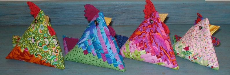 Chicken Patchwork Sewing Pattern is a tutorial to make 3D fabric birds from Log Cabin quilt blocks, PDF Easter crafts by Tikki London, there's an opening in the back seam to allow for small Easter eggs to be hidden inside.