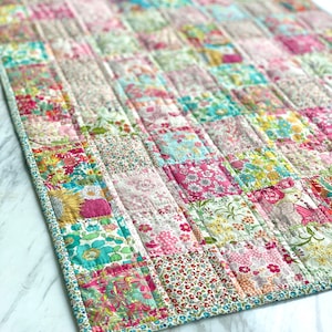 Baby Quilt PDF Pattern easy small crib size beginner patchwork design made up in Liberty ditsy floral fabrics, make your own baby heirloom