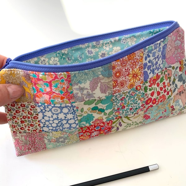 Easy Patchwork Pencil Case PDF Sewing Pattern, sample pouch made in pretty Liberty London ditsy floral fabrics, quilted zip bag tutorial.