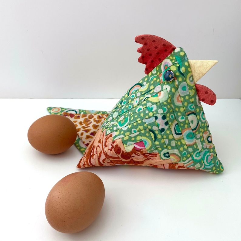 Chicken Patchwork Sewing Pattern is a tutorial to make 3D fabric birds from Log Cabin quilt blocks, PDF Easter crafts by Tikki London, there's an opening in the back seam to allow for small Easter eggs to be hidden inside.