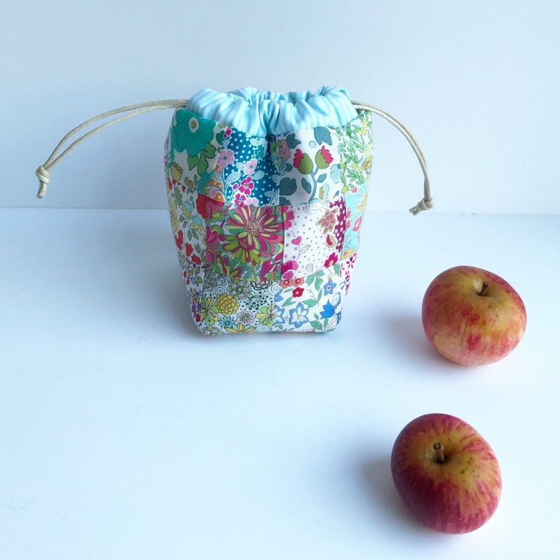 Drawstring Patchwork Bag Pattern, easy sewing tutorial for small modern pouch design, beginner friendly PDF instructions download by Tikki