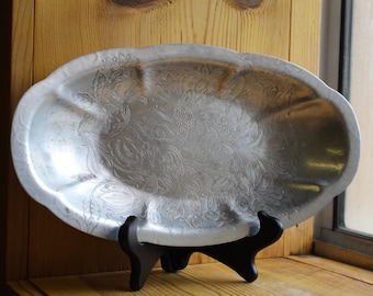 Gebloemd geëtst aluminium broodbord