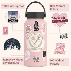 May include: A pink water bottle with a black handle and lid, decorated with several stickers. The stickers display phrases such as "Stars listen dreams Answer", "I'm here for RED FLAGS", and "READ MORE BOOKS". The bottle is labelled "CITORANDCRAFTBOUMODE HANDCRAFTED".