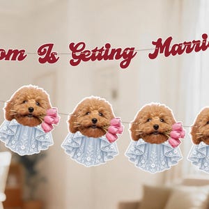 May include: A decorative banner featuring the text Mom Is Getting Married in dark red script, accompanied by five repeating cutouts of a brown poodle puppy wearing a light blue lace collar and holding a bouquet of pink tulips in its mouth.