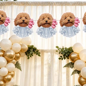 May include: A decorative banner featuring five repeating cutouts of a brown poodle dog face holding a bouquet of pink tulips in its mouth, with each dog wearing a light blue lace-patterned collar, all strung together on a thin white cord.