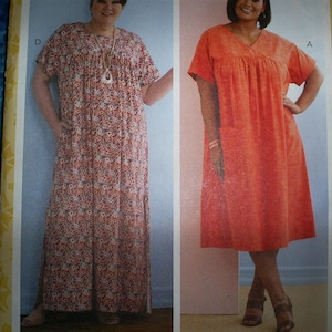 May include: A sewing pattern illustration featuring two dress styles. Style D is a floor-length, short-sleeved dress with a small floral print and side slits. Style A is a knee-length, short-sleeved solid orange dress with a V-neckline and pockets.