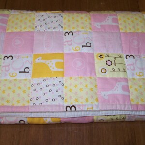 Yellow and Pink Hand Quilted Flannel Blanket