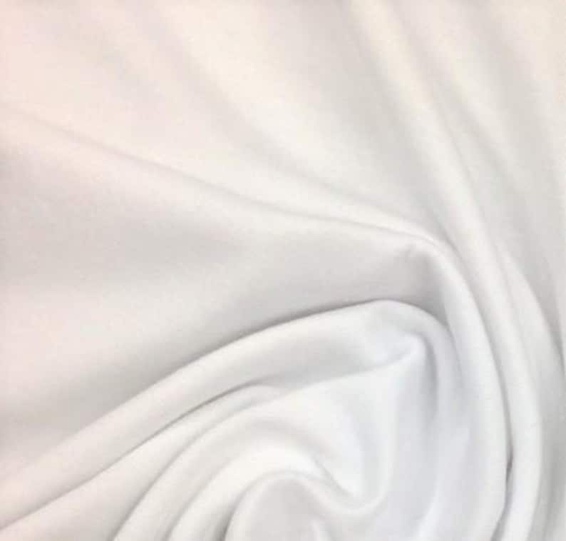 May include: White fabric with a smooth texture and soft folds.