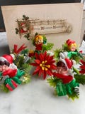 8 Vintage Mid-Century Christmas Elves And Poinsettia Picks, 8 assorted per listing, 4 elf’s-4 holly, about 2 inches in size.