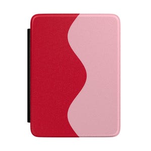 May include: A red and pink patterned tablet case with a black strap. The case is divided into two sections, with a wavy line separating the red and pink sides. The case has a textured appearance.