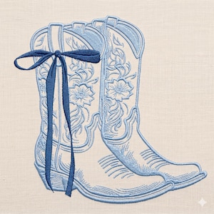 May include: Embroidered light blue cowboy boots with floral detailing and a matching bow. The boots are set against a neutral background, showcasing the intricate stitching and design. A decorative accent for country-themed decor.