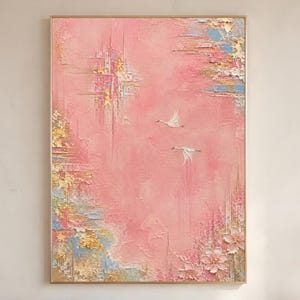 May include: A rectangular canvas painting featuring a textured pink background with two white birds in flight. The artwork includes raised impasto details in gold, blue, and white, with sculpted floral elements in the bottom right corner.