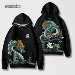 May include: Black hooded sweatshirt with a vibrant dragon illustration. The dragon, in blue, orange, and gold, is set against a wave pattern. Japanese characters are also present. The sweatshirt has a hood with a drawstring.