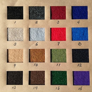 May include: A color chart featuring sixteen fabric swatches in various colors, including black, gray, red, blue, beige, and green. Each swatch is labeled with a number from 1 to 16, providing a visual guide for color selection.