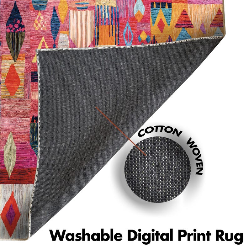 May include: A vibrant, geometric patterned rug with a pink backdrop and shapes in orange, blue, and yellow. The rug is labelled "Washable Digital Print Rug" and is made of cotton.