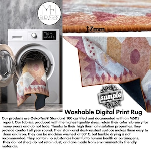 May include: A washable digital print rug with a geometric design in shades of red, orange, and cream is shown inside a washing machine. The rug's thickness is 17mm. The rug is stain and dust resistant.