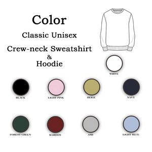 May include: A white ceramic mug with a black handle and the text "But First, Coffee" in a bold, black font. The mug is set against a blurred background, suggesting a cozy setting.