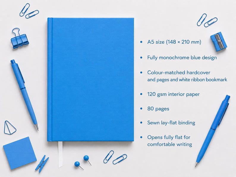 Elegant blue stationery notebook featuring 80 pages of blue paper, hardcover construction, and sewn binding, displayed open to highlight its functional and artistic design.