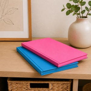 Fully monochrome blue journal featuring color-matched cover and pages, designed for comfortable everyday writing with a sewn lay-flat spine and premium quality paper.
