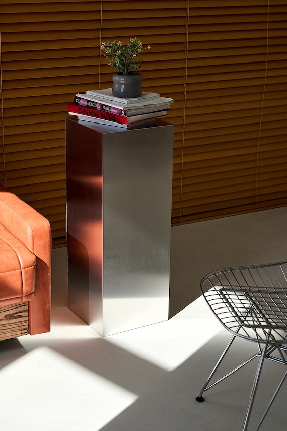 Aluminium stand. Living room decor. Metal shelf for vase. Minimalist furniture