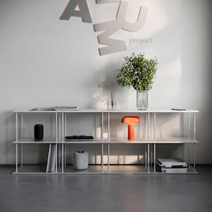 May include: A rustic wooden sign with the text "Welcome to our home" in white lettering. The sign features a distressed finish and a simple, inviting design, perfect for entryway decor.