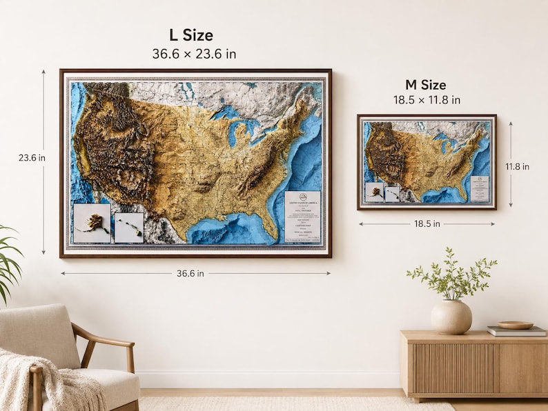 May include: Two framed relief maps of the United States, one large (36.6 x 23.6 inches) and one medium (18.5 x 11.8 inches). The maps feature detailed topography in shades of brown and gold, with blue representing water bodies. The frames are dark brown.