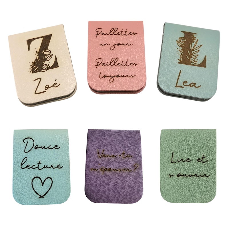 May include: Six rectangular magnetic bookmarks in various pastel colors including cream, pink, light blue, purple, and mint green. Each bookmark features custom black text or initials, such as Z, Zo&eacute;, Paillettes un jour, Paillettes toujours, L, Lea, Douce lecture, Veux-tu m'&eacute;pouser?, and Lire et s'ouvrir.