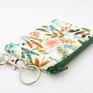 Porta-moedas de pulso | Porta-moedas com estampa floral | Linda bolsa com zíper e chaveiro para menina | Presente para ela
