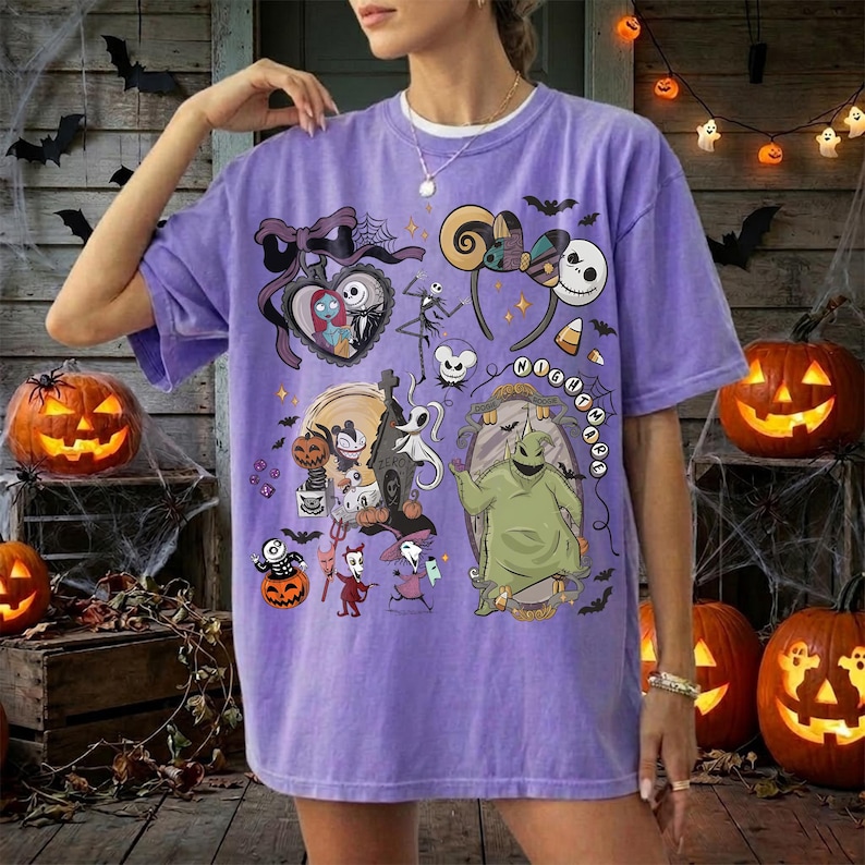 May include: A light purple t-shirt featuring a graphic print of characters and icons from The Nightmare Before Christmas, including Jack Skellington, Sally, Oogie Boogie, and Zero, arranged in a collage style with various Halloween motifs.