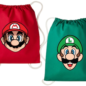 May include: Two drawstring bags, one red and one green, each with a cartoon character face. The red bag shows Mario with a red cap, and the green bag shows Luigi with a green cap. Both have white drawstrings.