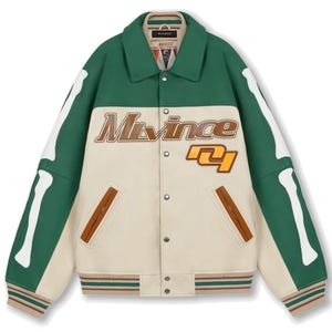 May include: A green and cream-colored varsity jacket with bone-shaped white accents on the sleeves. The jacket features the name "Mivince" in brown lettering and a number "71" patch. It has a ribbed collar, cuffs, and hem.